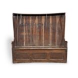 A George III boarded oak canopy high-back bowfronted settle, West Country, circa 1780
