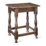 A Queen Anne joined oak table-stool, circa 1710