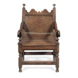 A william & Mary joined oak panel back adolescent's open armchair, North Country, circa 1690