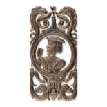 A rare and interesting carved and pierced oak portrait panel, English, circa 1540-60, possibly of...