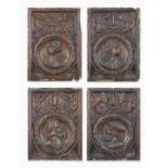 A set of four early to mid-16th century carved oak 'Romayne'-type portrait panels, French/Flemish...