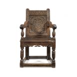 A Charles I joined oak panel back armchair, Devon, circa 1630