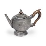 A rare George II pewter bullet-shaped touchmarked teapot, circa 1730
