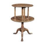 A George II oak two-tier tripod pedestal table, circa 1750 Popularly referred to as a 'dumb-waiter'
