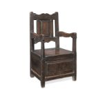 A william & Mary joined oak box-seat panel-back open armchair, North Wales, circa 1690