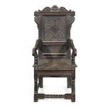 A 19th century joined oak and inlaid panel-back open armchair, South Yorkshire/Derbyshire