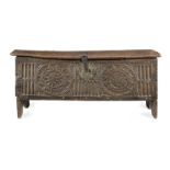 A rare Henry VII/VIII boarded and carved oak chest, circa 1490-1520