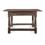 A mid-17th century joined oak side table, English, circa 1650