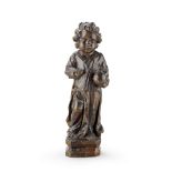 A late 17th/early 18th century carved walnut, gesso and polychrome figure of the infant Christ