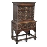 A rare and particulary small William & Mary joined oak chest-on-stand, circa 1690