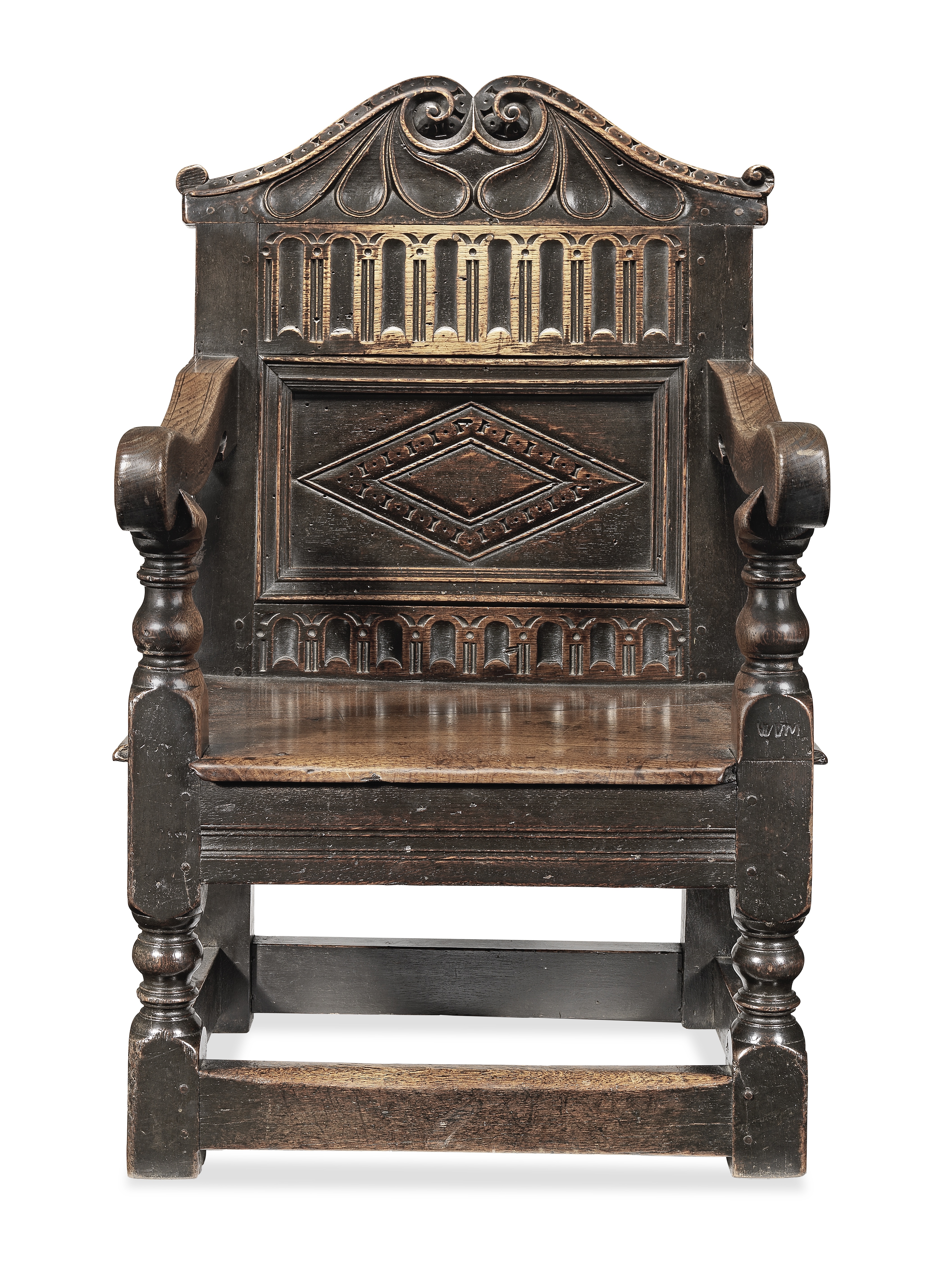 A good Elizabeth I joined oak panel-back open armchair, circa 1590