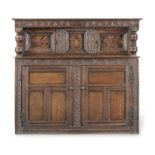 A Charles I joined oak and inlaid court cupboard, Yorkshire, circa 1640