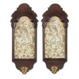 A pair of walnut wall-sconces with needlework panels (2)