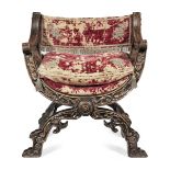 A 16th century walnut and upholstered so-called savonorla chair, Italian Traces of original polyc...