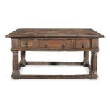 A 16th century joined walnut centre table, with drawers, Italian, circa 1580