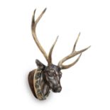 An impressive late 19th/early 20th century carved and painted deer's head, German/Austrian