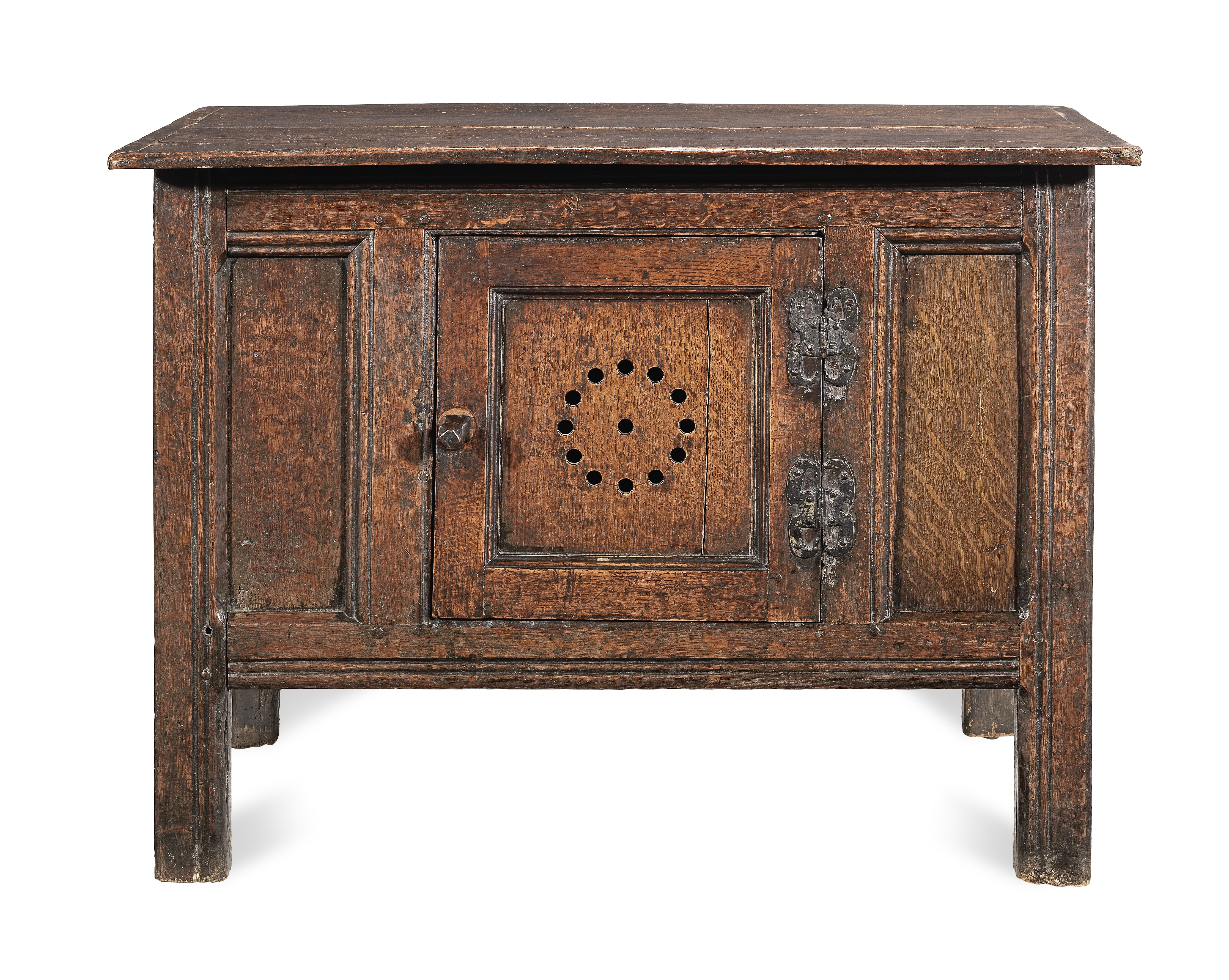 A rare Elizabeth I joined oak and elm splayed livery cupboard or food-hutch, circa 1560