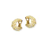 A pair of diamond and ruby earclips, by Mappin & Webb,