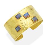 A gold and opal doublet cuff, by Gerald Benney,