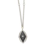 An onyx and diamond pendant necklace