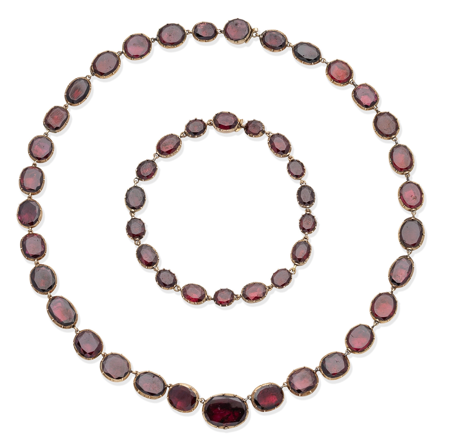 A 19th century garnet rivière and bracelet suite (2)