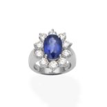 A sapphire and diamond cluster ring