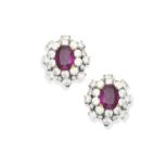 A pair of ruby and diamond cluster earrings