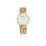 Patek Philippe. A lady's 18K gold and diamond set manual wind bracelet watch Calatrava, Ref: 500...
