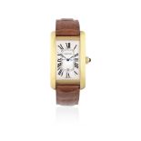 Cartier. An 18K gold automatic rectangular calendar wristwatch Tank Américaine, Ref: 1740, Circa...