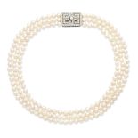 A cultured pearl necklace with a diamond clasp