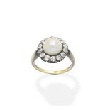 A natural half pearl and diamond cluster ring