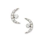 A pair of diamond crescent earrings