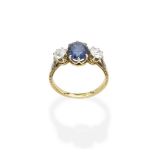 A sapphire and diamond three-stone ring