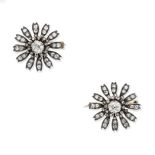 A pair of late 19th century diamond flower brooches (2)
