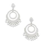 A pair of diamond pendent earrings