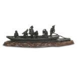 A large and impressive bronze group of figures on a ferry on matching wood stand Meiji Era, unsigned