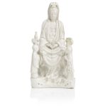 A blanc-de-chine figure of Guanyin and attendants 17th/18th century