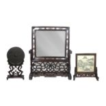 Two hongmu table screens together with a bronze mirror on stand Late 19th/ early 20th century (6)