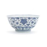 A blue and white 'floral' bowl Qianlong seal mark, 19th/20th century