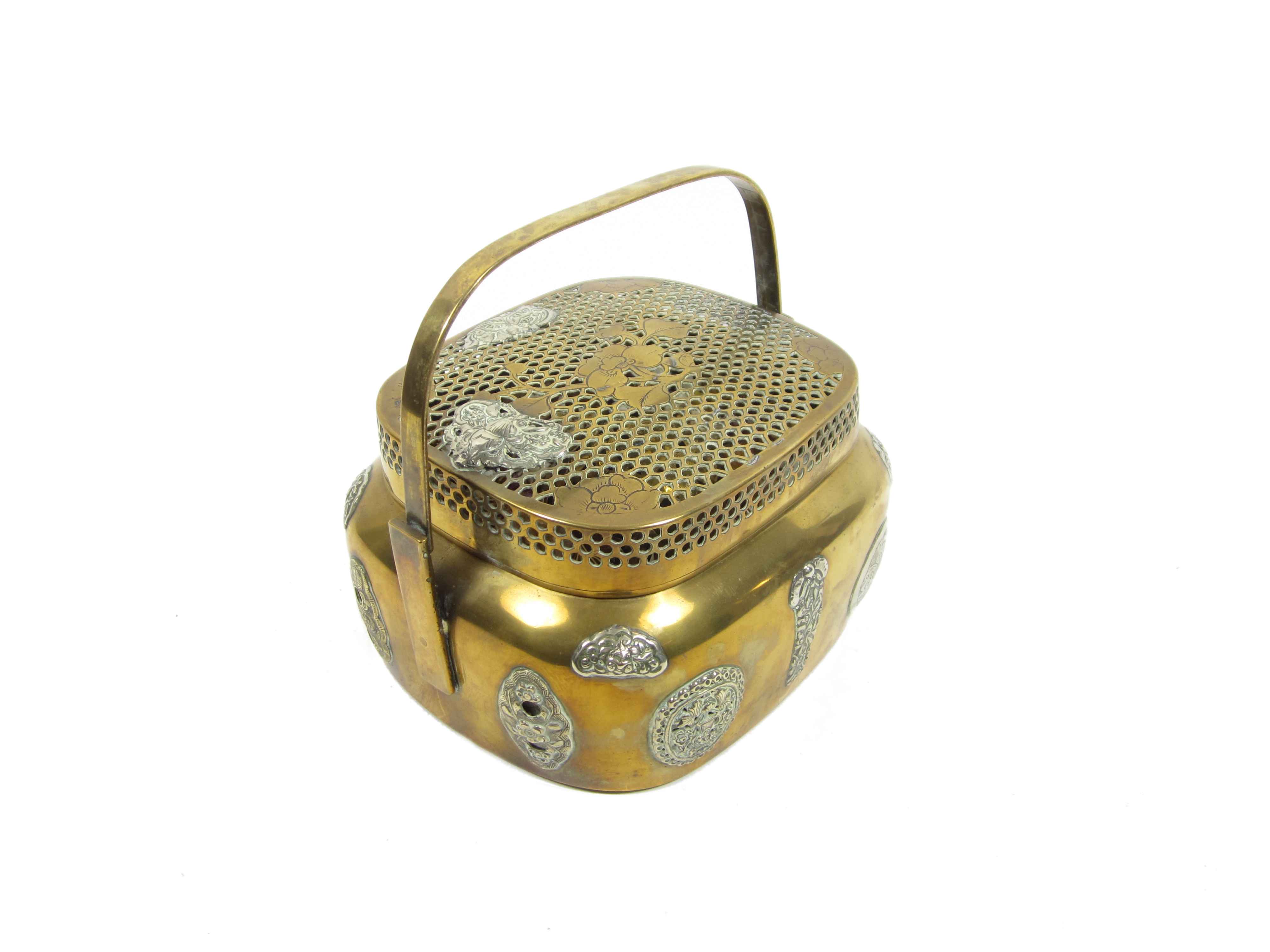 A bronze hand warmer with reticulated cover 19th century (3)