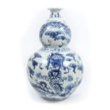 A blue and white double gourd vase