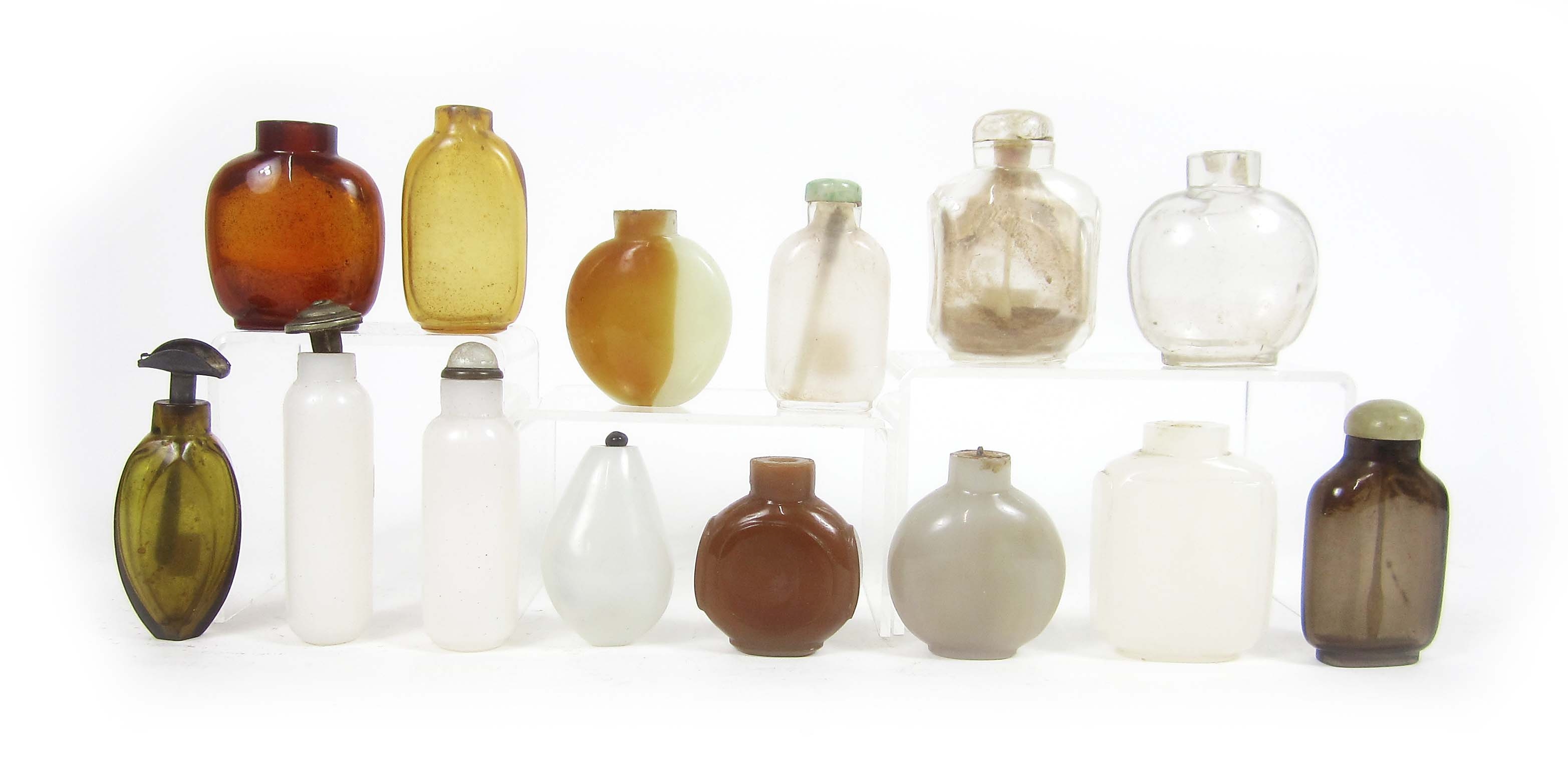 A group of glass snuff bottles Late Qing/Republic Period (14, plus assorted stoppers)