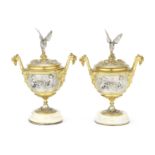 A pair of late 19th century / early 20th century French parcel gilt and silvered bronze and onyx ...