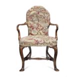 A George I walnut open armchair