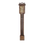 A first half of the 19th century satinwood banded mahogany stick barometer signed Anthony Rivolt...