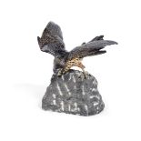 An Austrian cold painted bronze model of a sparrow hawk perched on a rock in the manner of Franz...