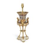 An early 20th century French gilt bronze, champlevé enamel and veined onyx lamp base in the mann...