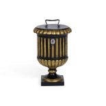 An early 19th century ebonised and gilt urn tea caddy probably Northern European