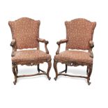 A pair of French 19th century walnut fauteuils in the early Louis XV style (2)