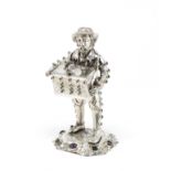 A German silver model of an organ grinder with London import marks for 1900